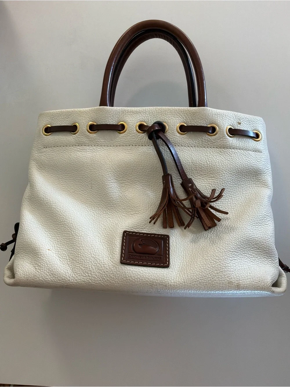Dooney & Bourke White Pebbled Leather Satchel with Brown Trim and Tassel
